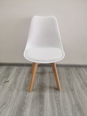 40'HQ sillas de salón con cojín de PU 1488pcs precios silla de comedor de tulipanes de madera nórdica